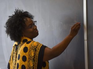 a photo of Elizabeth Kaganda teaching Swahili
