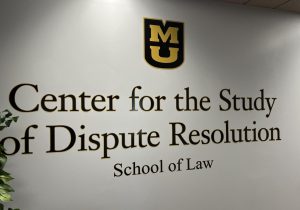 a photo of a sign saying Center for the study of dispute resolution