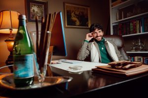 a photo of brandon bethel at a desk