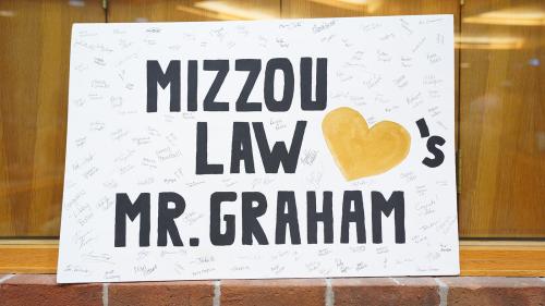 a photo of a sign reading mizzou law loves mr. graham
