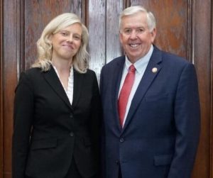 a photo of Ginger Gooch and Gov. Mike Parson