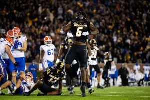 a photo of darius robinson playing in a football game