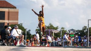 Euphenie Andre competing in a track event