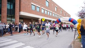 a photo of people running in the 2024 heinsz race