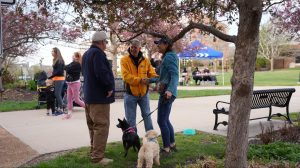 dean bailey speaking with race attendees