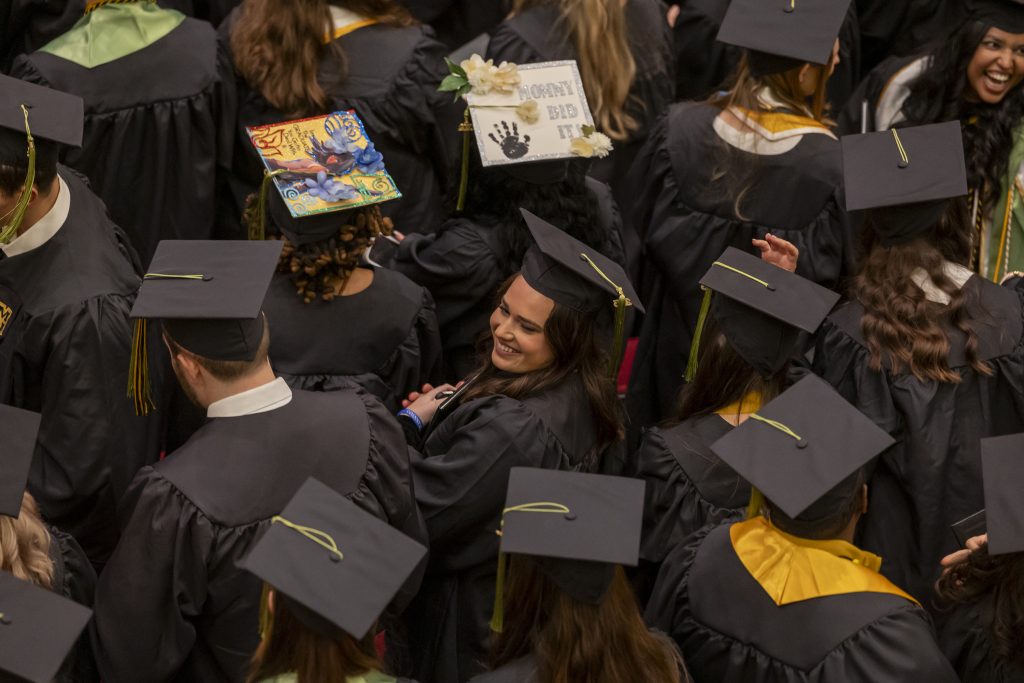 graduations wearing caps and gowns