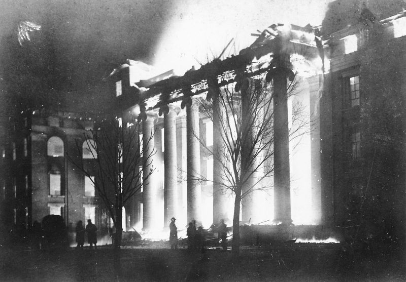 a photo of academic hall burning