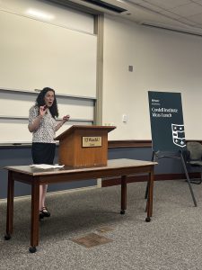professor lietzan speaking at a podium